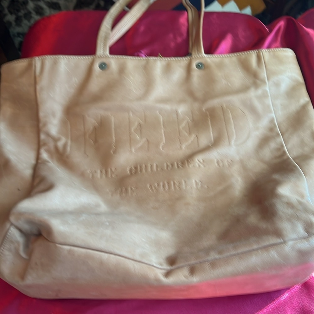 Feed The Children Of The World Leather Tote Bag Embossed Almond Tan